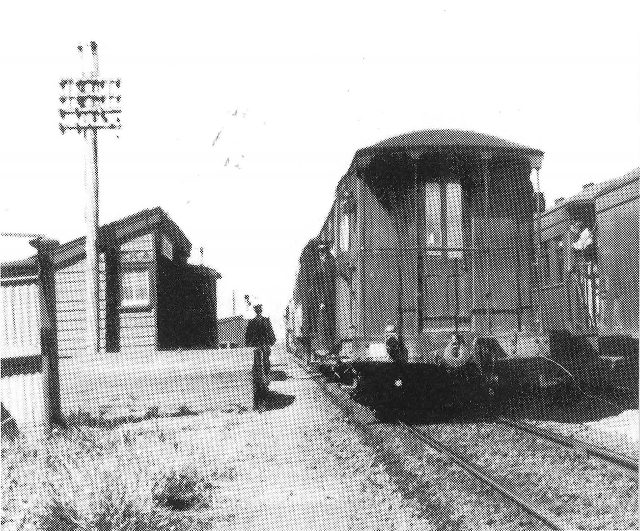 Two mixed trains crossing at Eureka. December 1949
